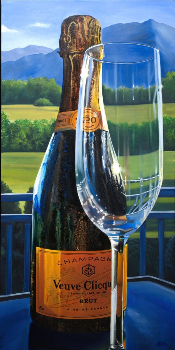 Monica Marquez Gatica's painting 'Celebration at Dusk' featuring a Veuve Clicquot champagne bottle and glass with the Flat Iron mountains in the background.