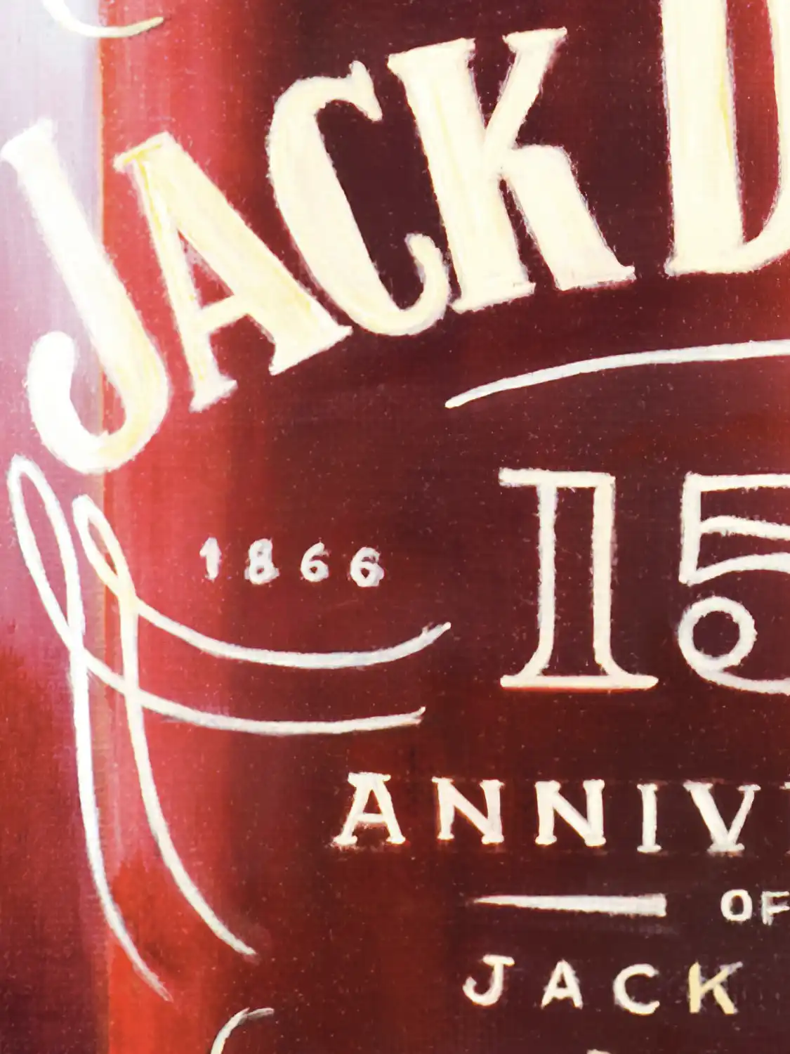 Close-up of the Jack Daniel's label in Monica Marquez Gatica's painting, showcasing the detailed oil typography.